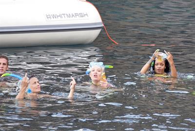 Rihanna enjoying a break on a yacht in Ponza August 29, 2014