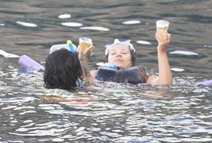 Rihanna enjoying a break on a yacht in Ponza August 29, 2014