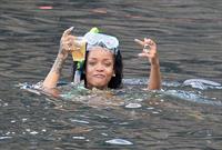 Rihanna enjoying a break on a yacht in Ponza August 29, 2014