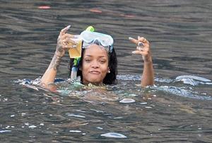 Rihanna enjoying a break on a yacht in Ponza August 29, 2014