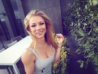 Nikki Leigh taking a selfie