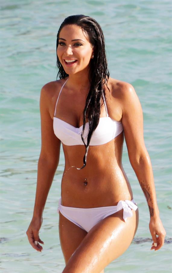 Tulisa Contostavlos in a bikini on the beach in Bermuda August 21, 2014