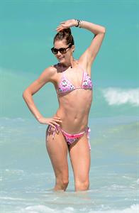 Doutzen Kroes enjoys a day on the beach in Miami Beach, FL on April 28, 2013