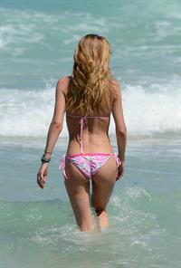 Doutzen Kroes enjoys a day on the beach in Miami Beach, FL on April 28, 2013