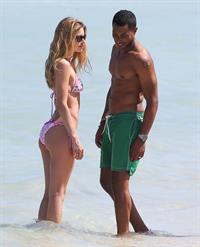 Doutzen Kroes enjoys a day on the beach in Miami Beach, FL on April 28, 2013