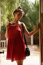 Sonya Ash in a red dress