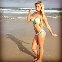 Anna Faith Carlson in a bikini taking a selfie