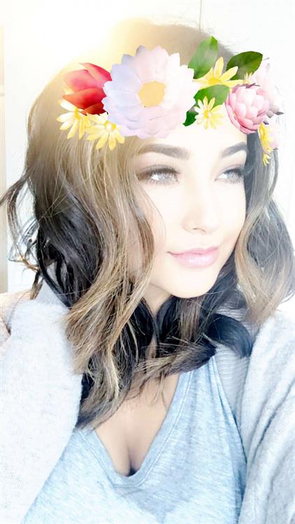 Becky G taking a selfie