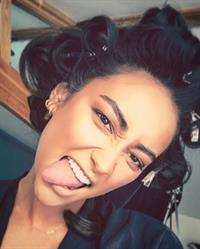 Shay Mitchell taking a selfie