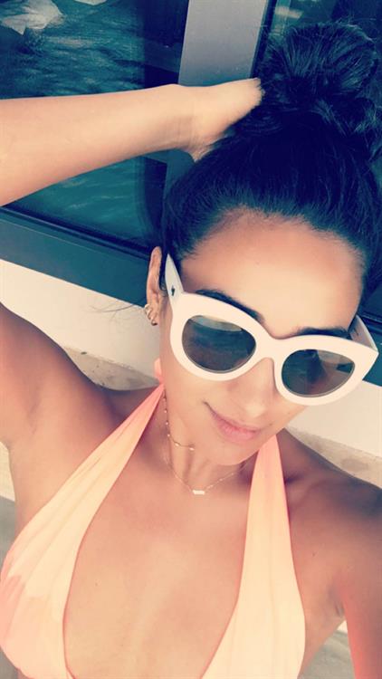 Shay Mitchell taking a selfie