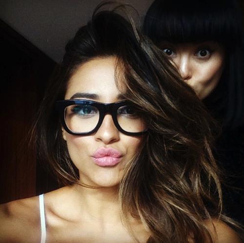 Shay Mitchell taking a selfie