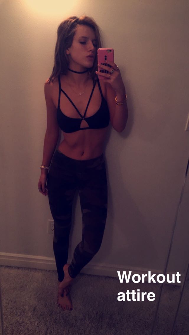 Bella Thorne in a bikini taking a selfie