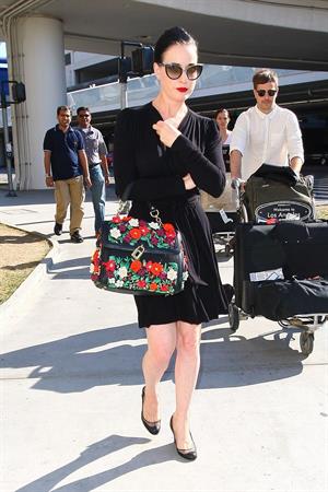 Dita Von Teese arrives from a flight at LAX August 20, 2014