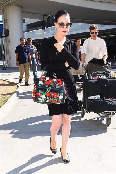 Dita Von Teese arrives from a flight at LAX August 20, 2014