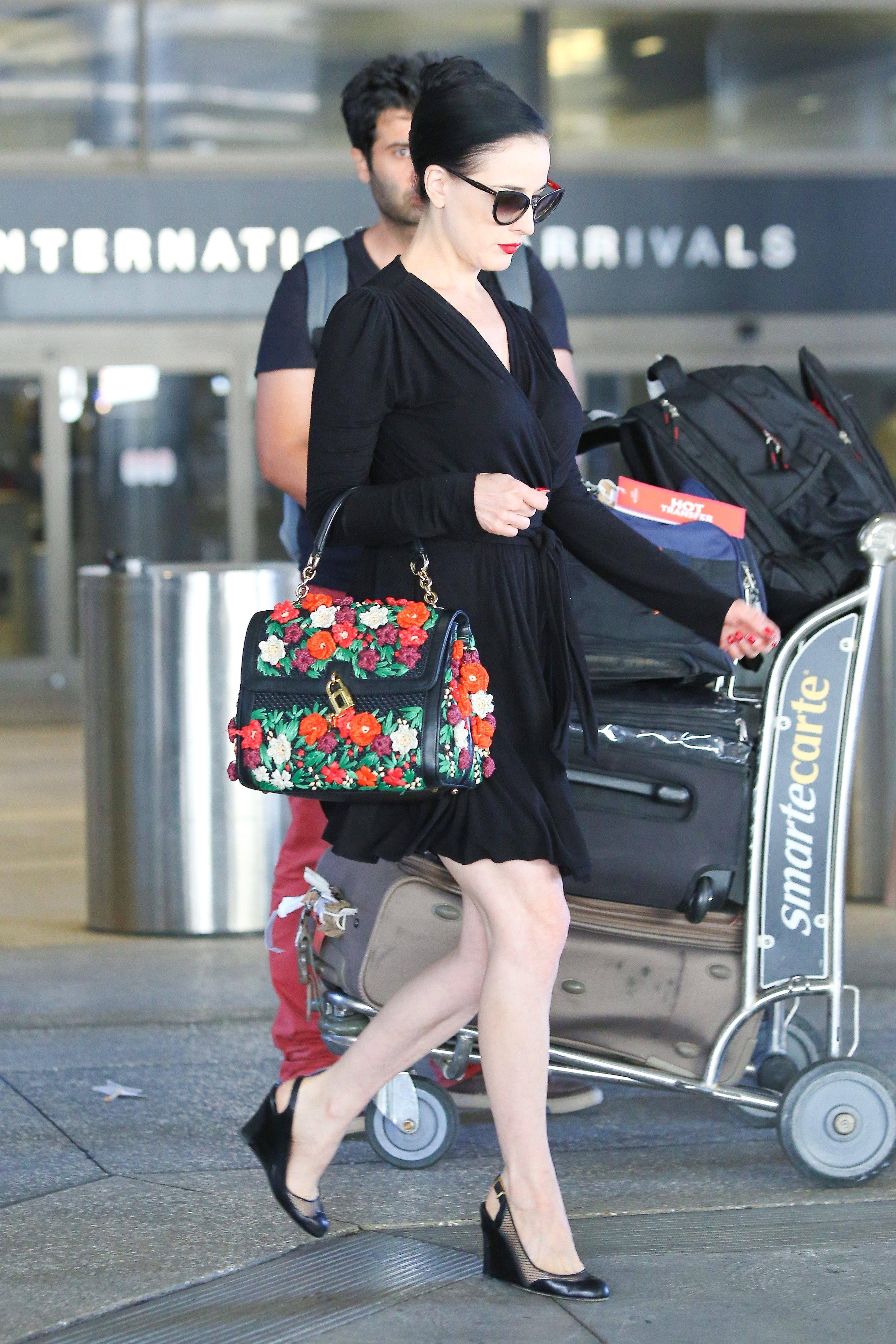Dita Von Teese arrives from a flight at LAX August 20, 2014