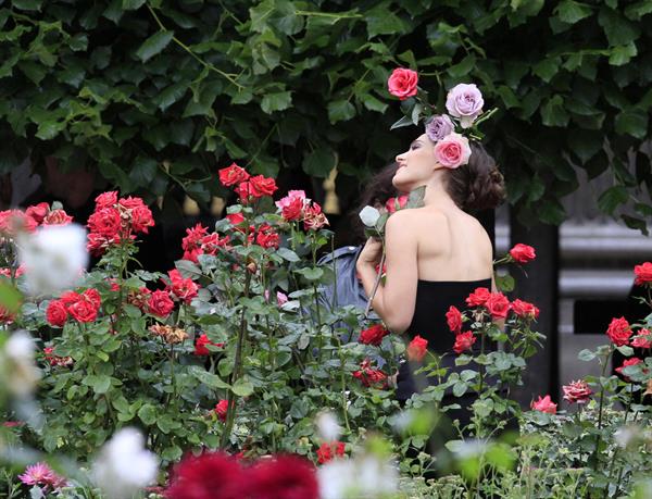 Natalie Portman modeling for a Miss Dior campaign photo shoot in the gardens of the Palais Royal in Paris 6/26/12 