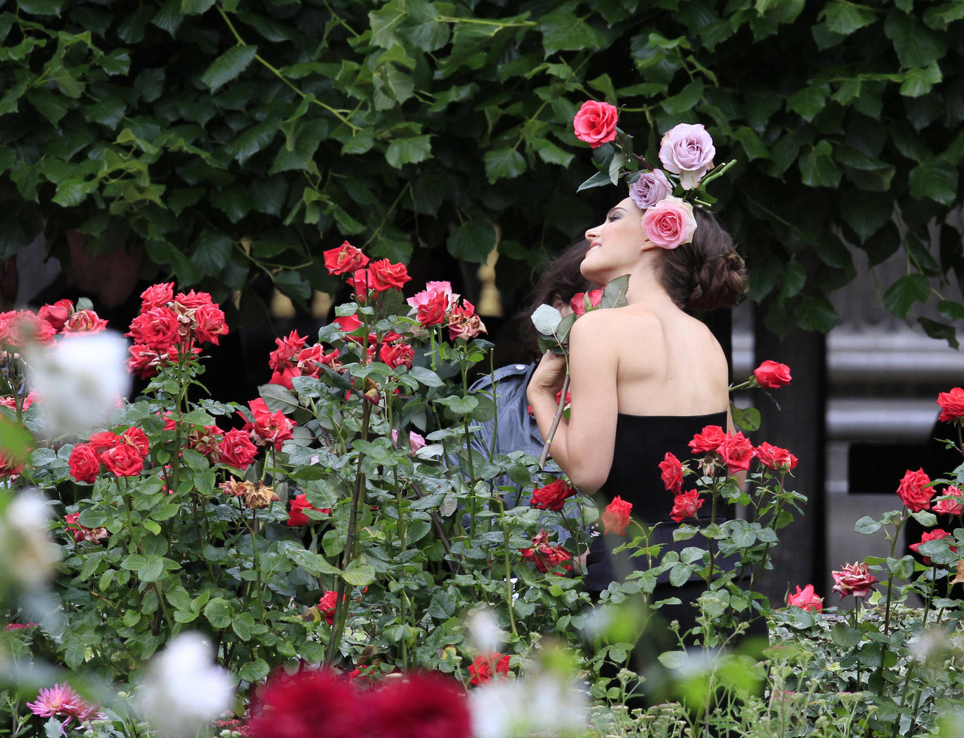 Natalie Portman Pictures Natalie Portman modeling for a Miss Dior campaign photo shoot in the gardens of the Palais Royal in Paris 6/26/12