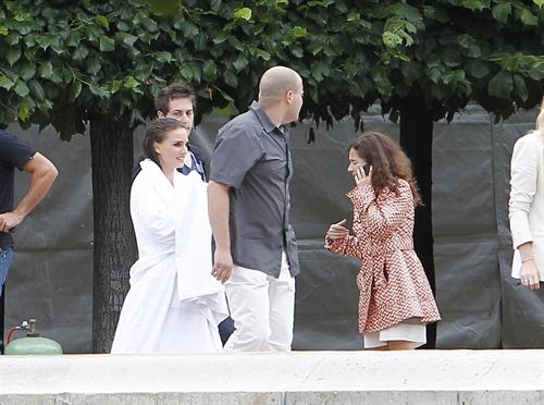 Natalie Portman modeling for a Miss Dior campaign photo shoot in the gardens of the Palais Royal in Paris 6/26/12 