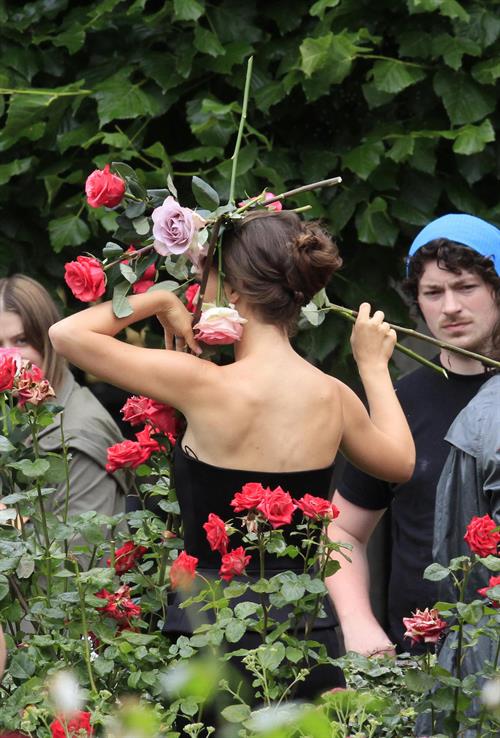Natalie Portman modeling for a Miss Dior campaign photo shoot in the gardens of the Palais Royal in Paris 6/26/12 