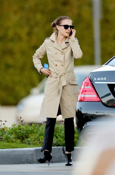Natalie Portman heads to a meeting in her trench coat at an office in Century City January 17, 2013 