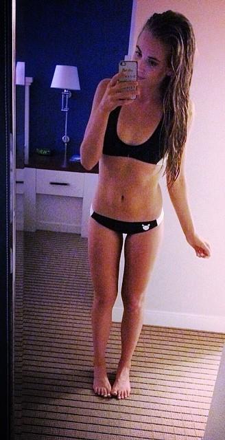 Rachel Annamarie DeMita in a bikini taking a selfie