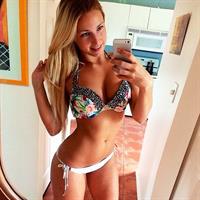 Maria Doroshina in a bikini taking a selfie