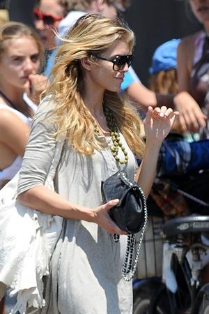 AnnaLynne McCords dress blew up to reveal her underwear in Venice, August 20, 2014