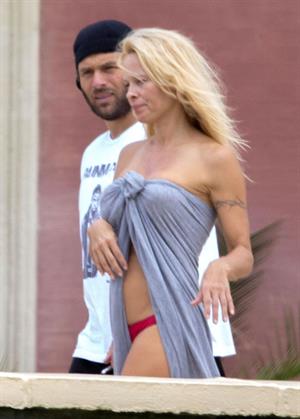 Pamela Anderson Pictures Pamela Anderson Pamela Anderson Going topless at the beach in France 02.10.13