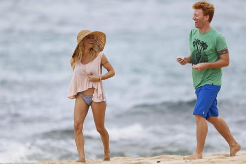 Pamela Anderson Takes a walk in bikini bottoms on the Island of Maui December 30, 2012 