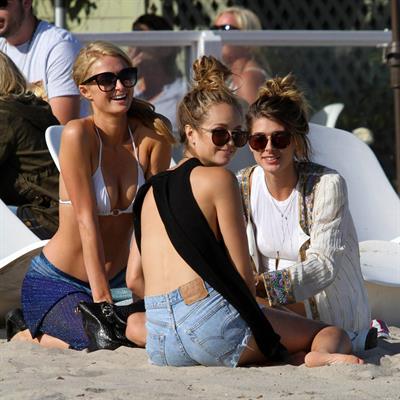 Paris Hilton a party on the beach in Malibu July 27, 2013