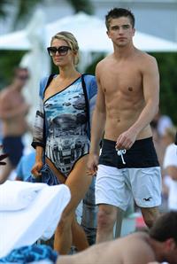 Paris Hilton spends the day in and out of the pool in Miami December 8, 2012