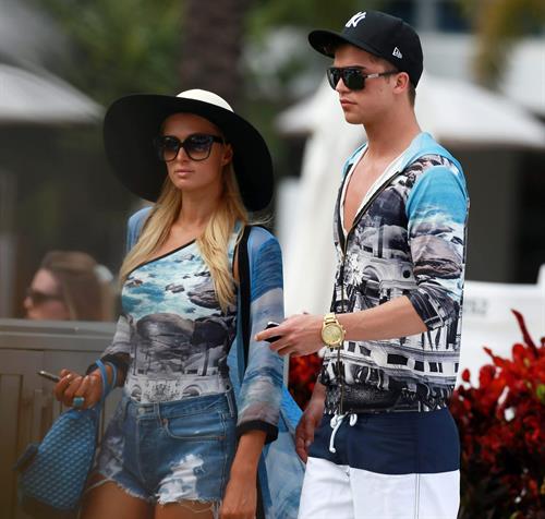 Paris Hilton spends the day in and out of the pool in Miami December 8, 2012