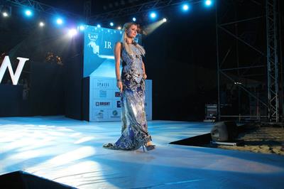 Paris Hilton walks for designer duo Shane and Falguni Peacock and performs as a DJ at the India Resort Fashion Week