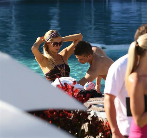 Paris Hilton poolside at their Miami hotel December 7-2012 
