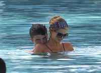 Paris Hilton poolside at their Miami hotel December 7-2012 