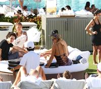 Paris Hilton poolside at their Miami hotel December 7-2012 