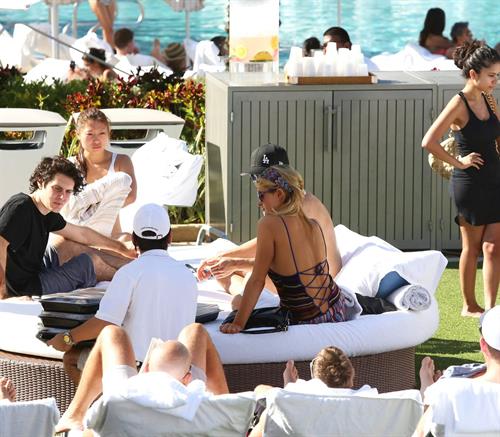 Paris Hilton poolside at their Miami hotel December 7-2012 