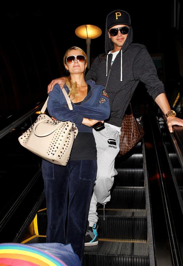 Paris Hilton and River Viiperi holding hands at LA. December 10, 2012 