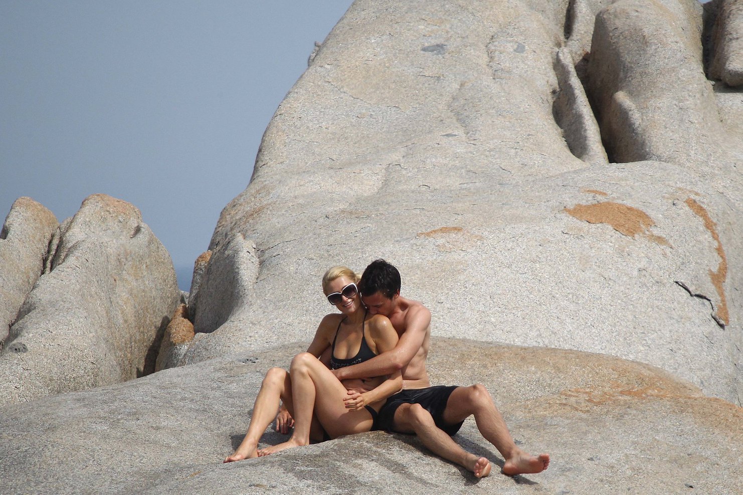 Paris Hilton - Wearing a swimsuit at a beach in France August 6, 2012