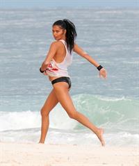 Adriana Lima – beach shoot candids in Cancun 12/2/13 