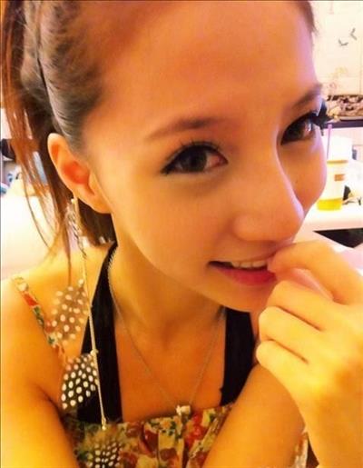 Lin Cai Ti taking a selfie