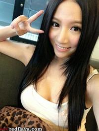 Lin Cai Ti taking a selfie