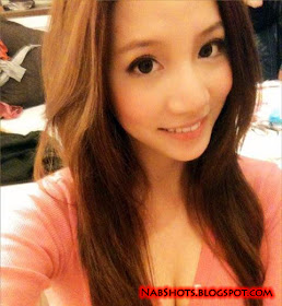 Lin Cai Ti taking a selfie