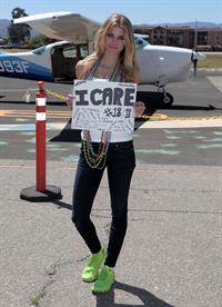 AnnaLynne McCord skydives from 18,000 feet at a charity event, Lompoc August 16, 2014