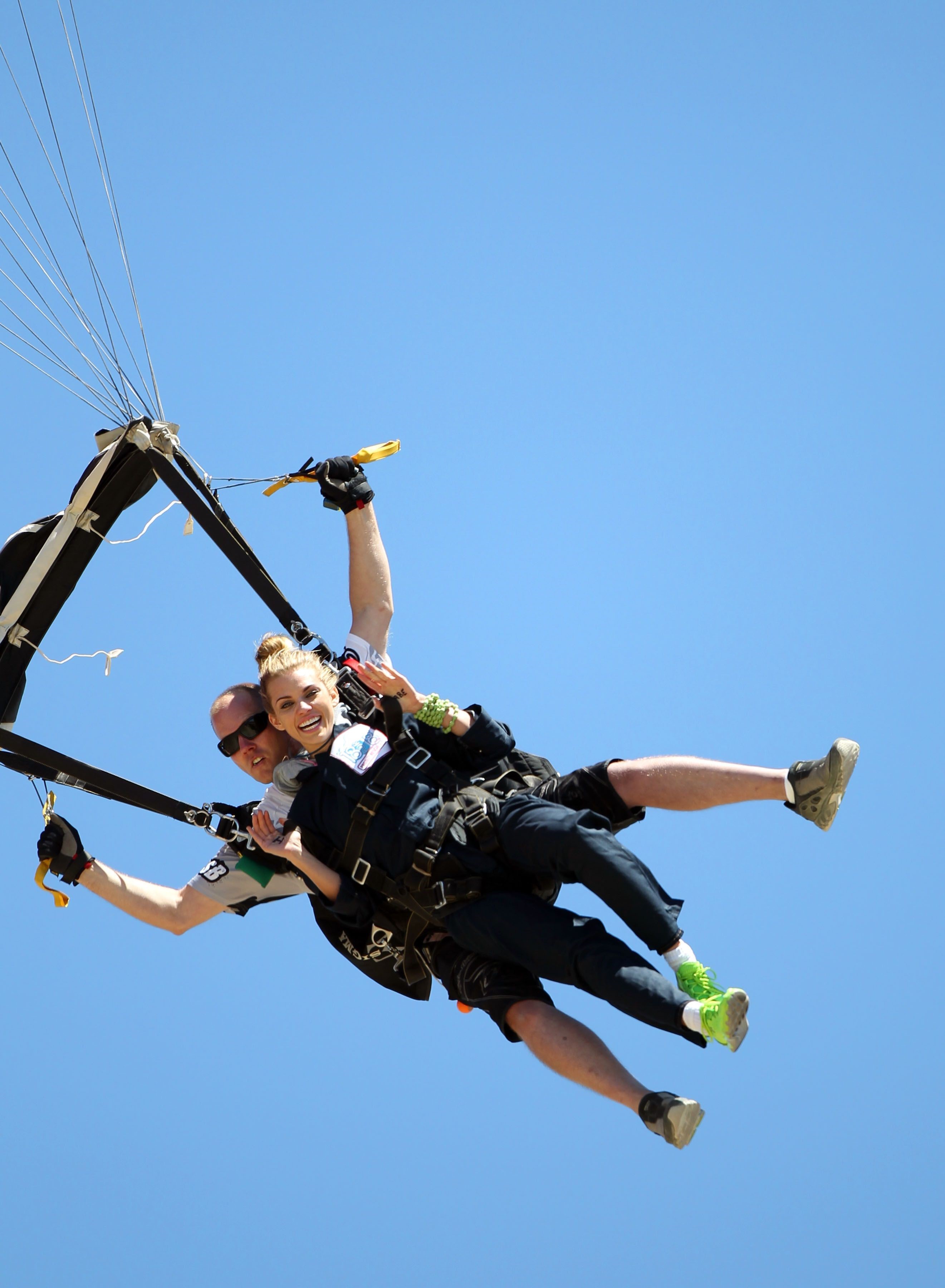 AnnaLynne McCord skydives from 18,000 feet at a charity event, Lompoc August 16, 2014