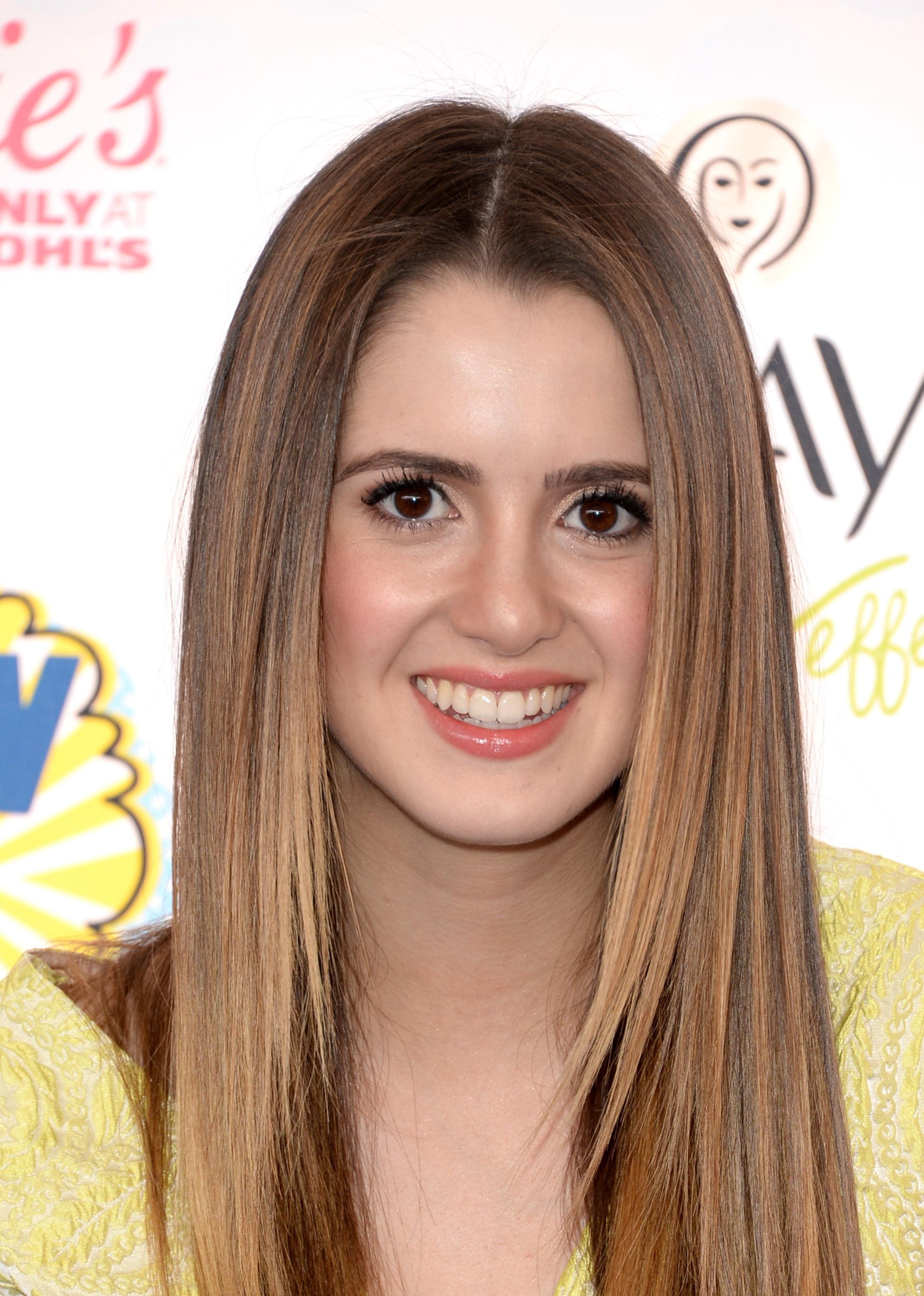 Laura Marano attending the 2014 Teen Choice Awards in Los Angeles on