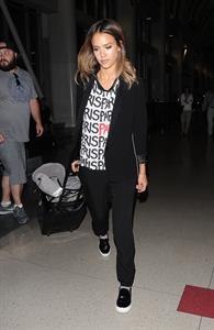 Jessica Alba arriving at LAX August 05, 2014