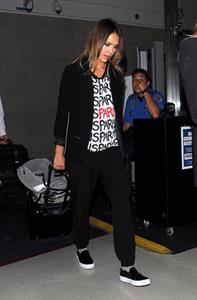 Jessica Alba arriving at LAX August 05, 2014
