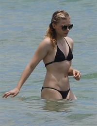 Chloe Grace Moretz candids in a Black Bikini in Miami Beach