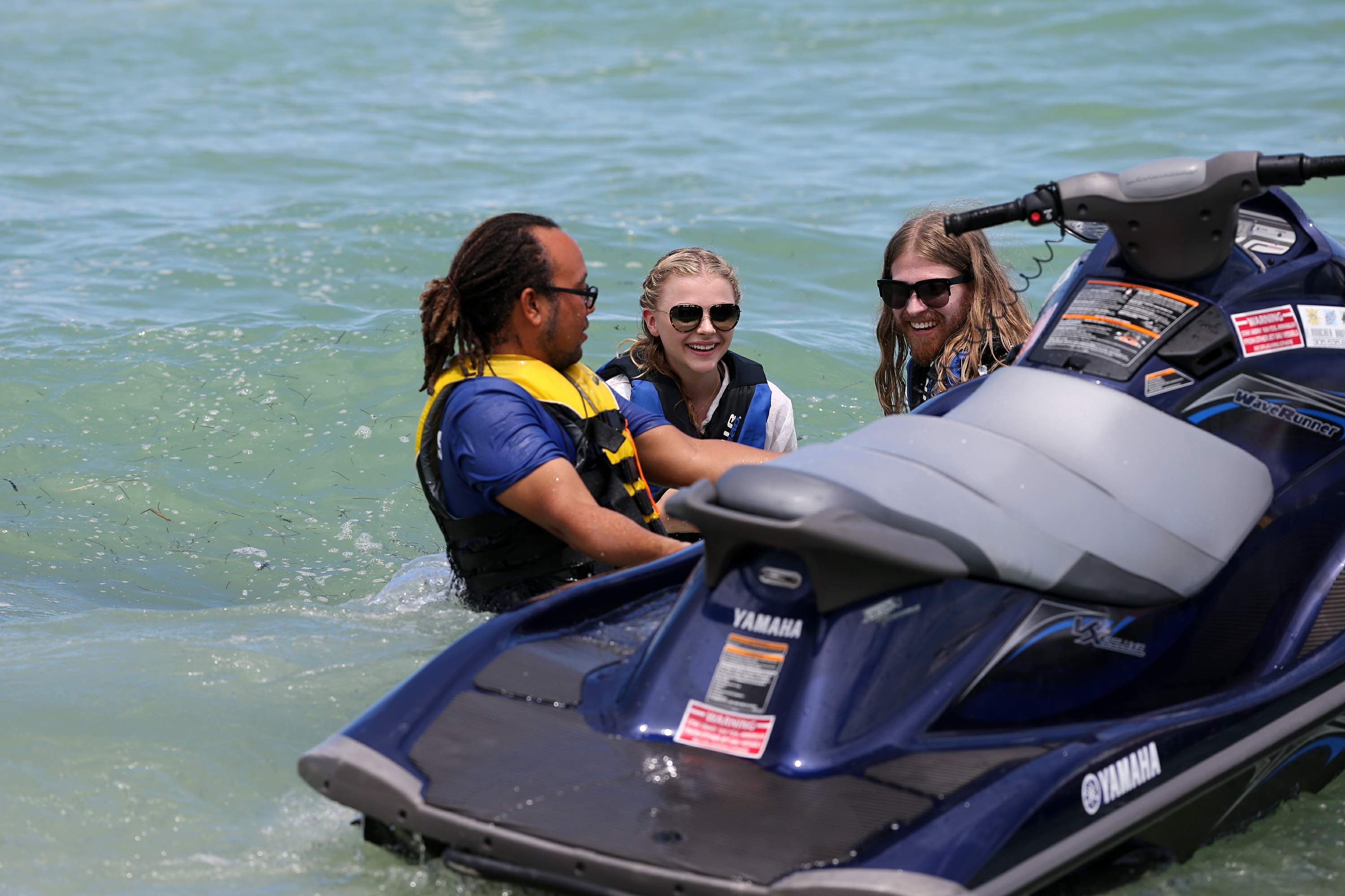 Chloe Grace Moretz candids in a Black Bikini in Miami Beach